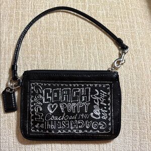 Coach Black Wristlet with White Artistic Pattern
